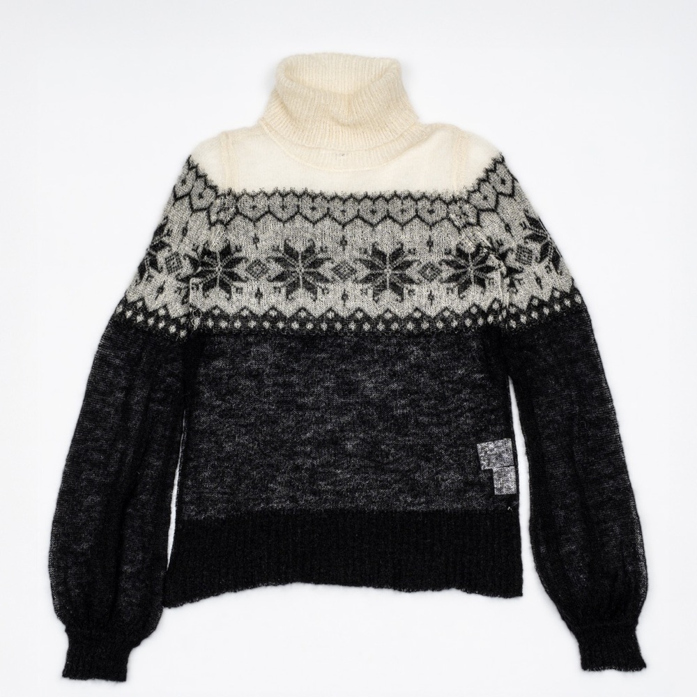 Fine gauge mohair wool blend sweater .